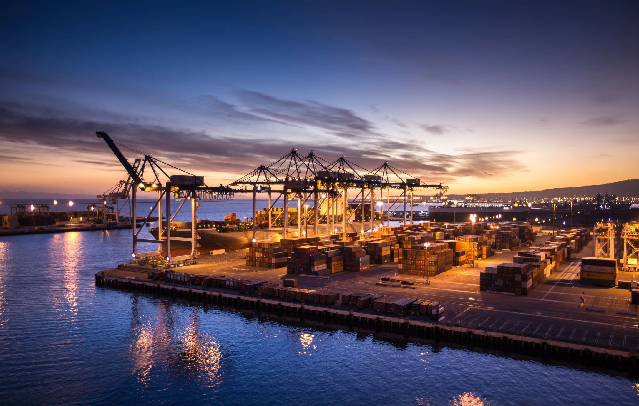 Container yard at a seaport during twilight